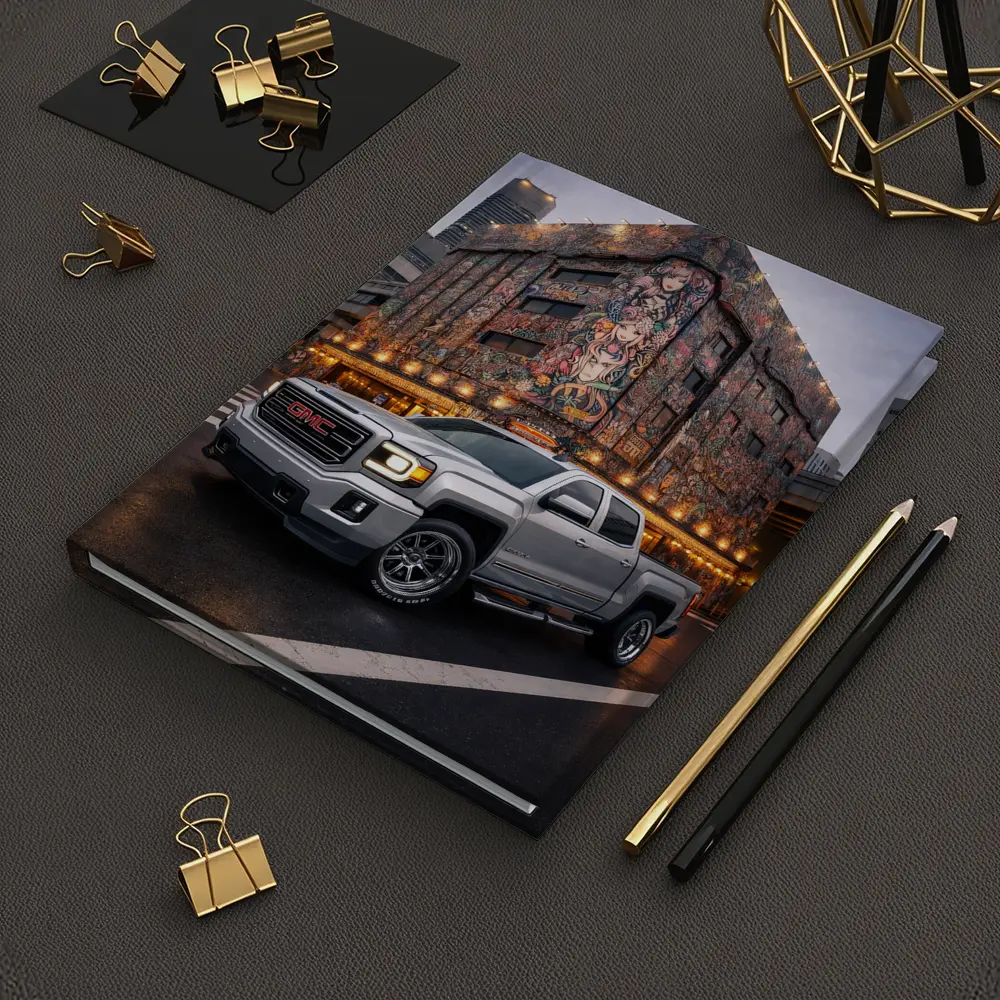 GMC Sierra Truck Parked Near Mural Building – Notebooks