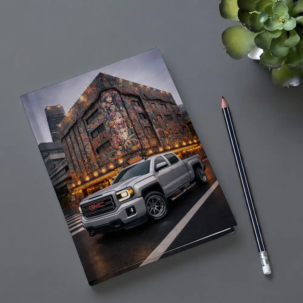 GMC Sierra Truck Parked Near Mural Building – Notebooks