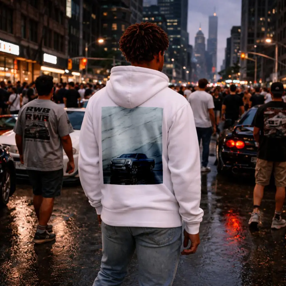GMC Sierra EV Against Marble Wall – Hoodies