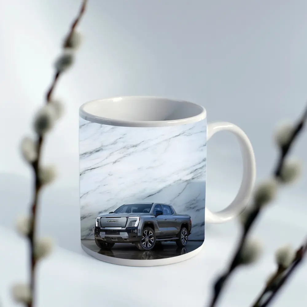 GMC Sierra EV Against Marble Wall – Mugs