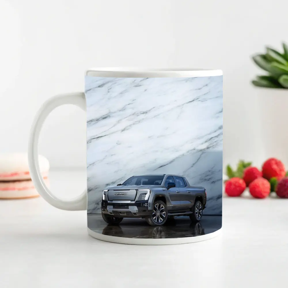GMC Sierra EV Against Marble Wall – Mugs