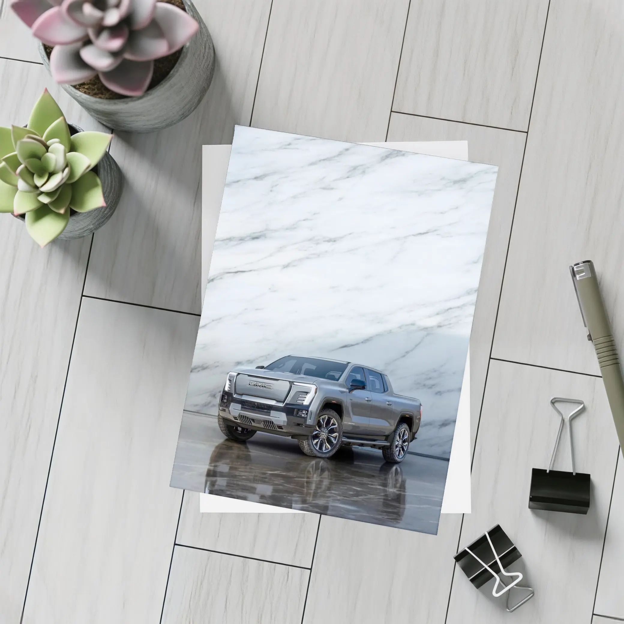 GMC Sierra EV Against Marble Wall – Postcards