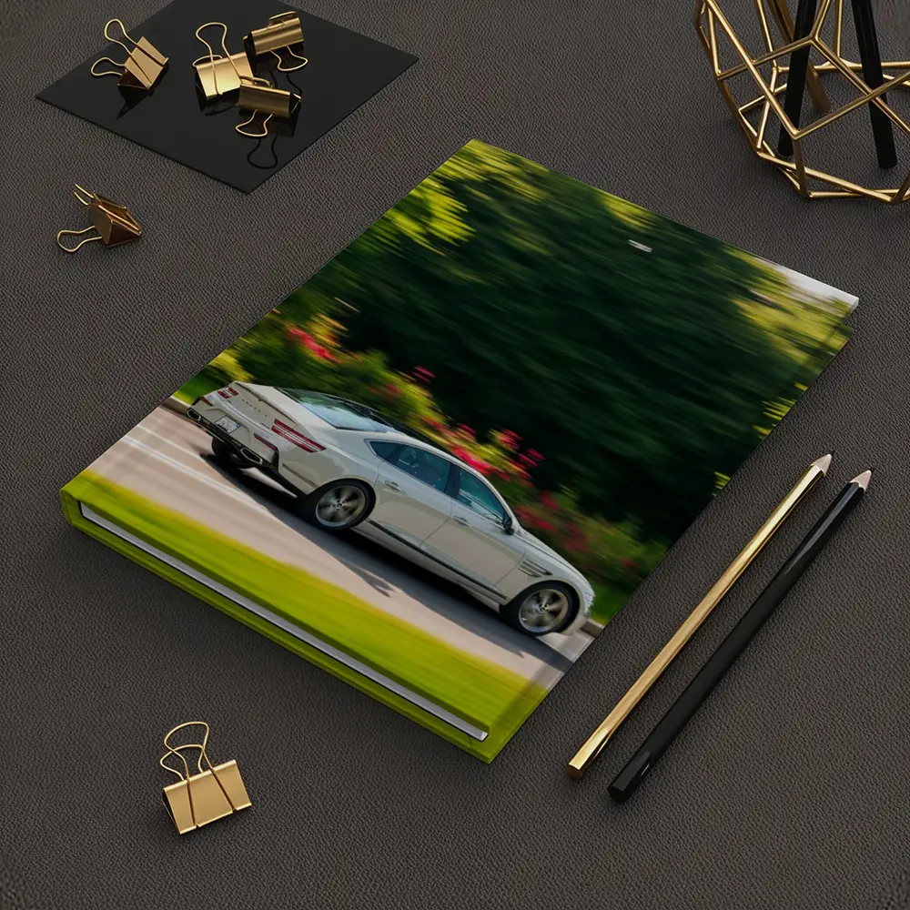 Genesis G80 Sedan Speeding Through Green Park – Notebooks