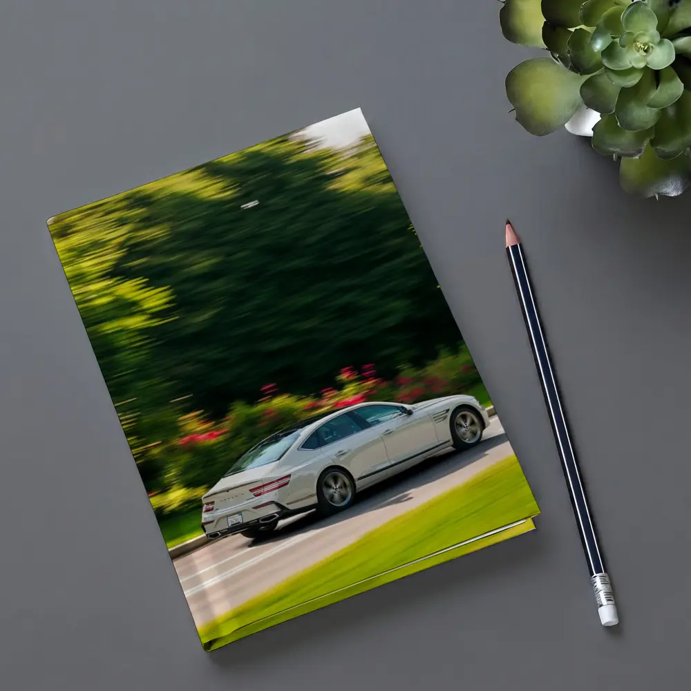 Genesis G80 Sedan Speeding Through Green Park – Notebooks