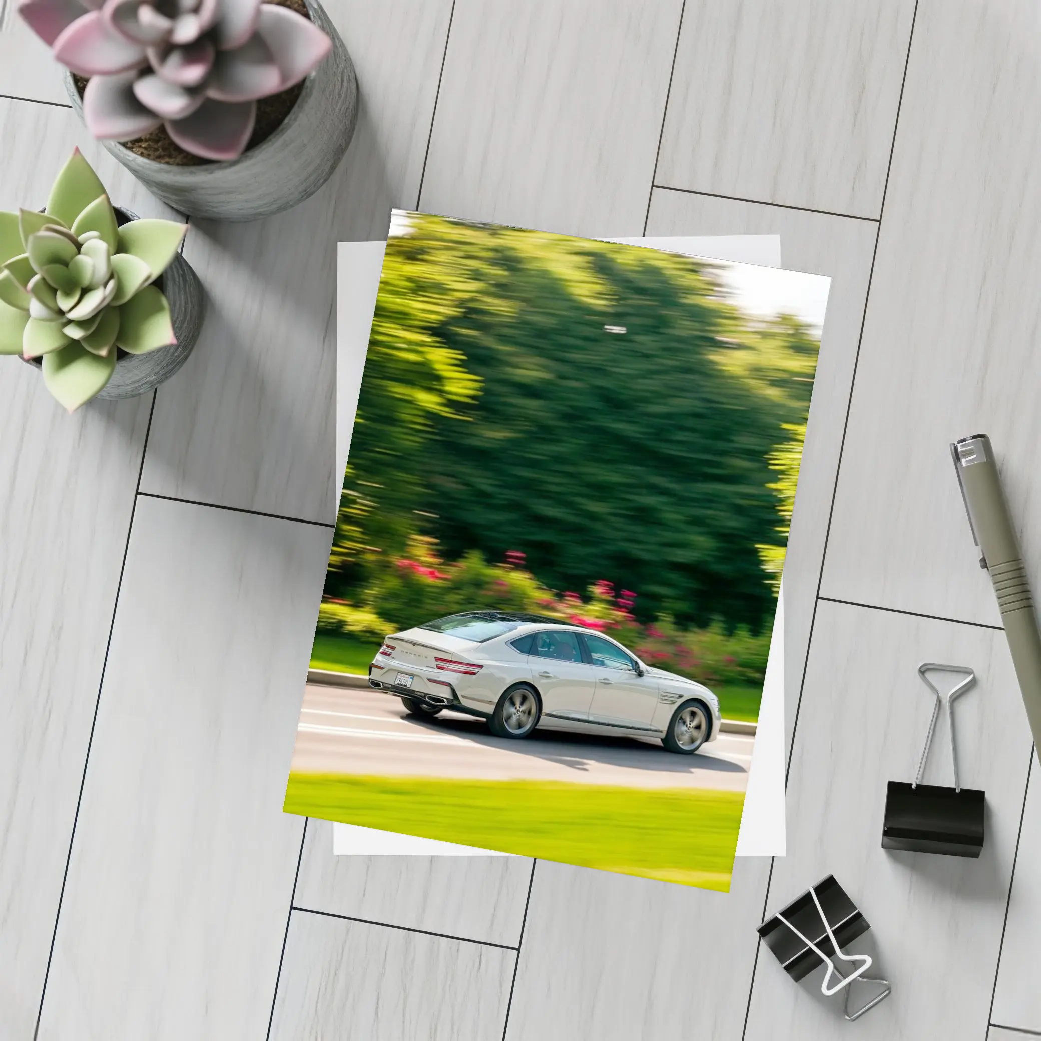 Genesis G80 Sedan Speeding Through Green Park – Postcards