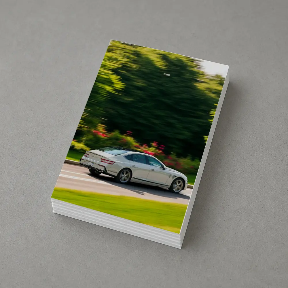 Genesis G80 Sedan Speeding Through Green Park – Postcards
