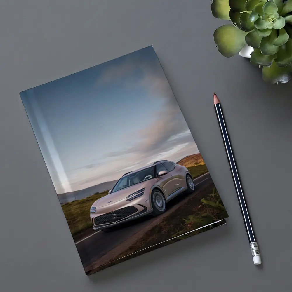 Genesis GV60 SUV on Scenic Highland Road – Notebooks