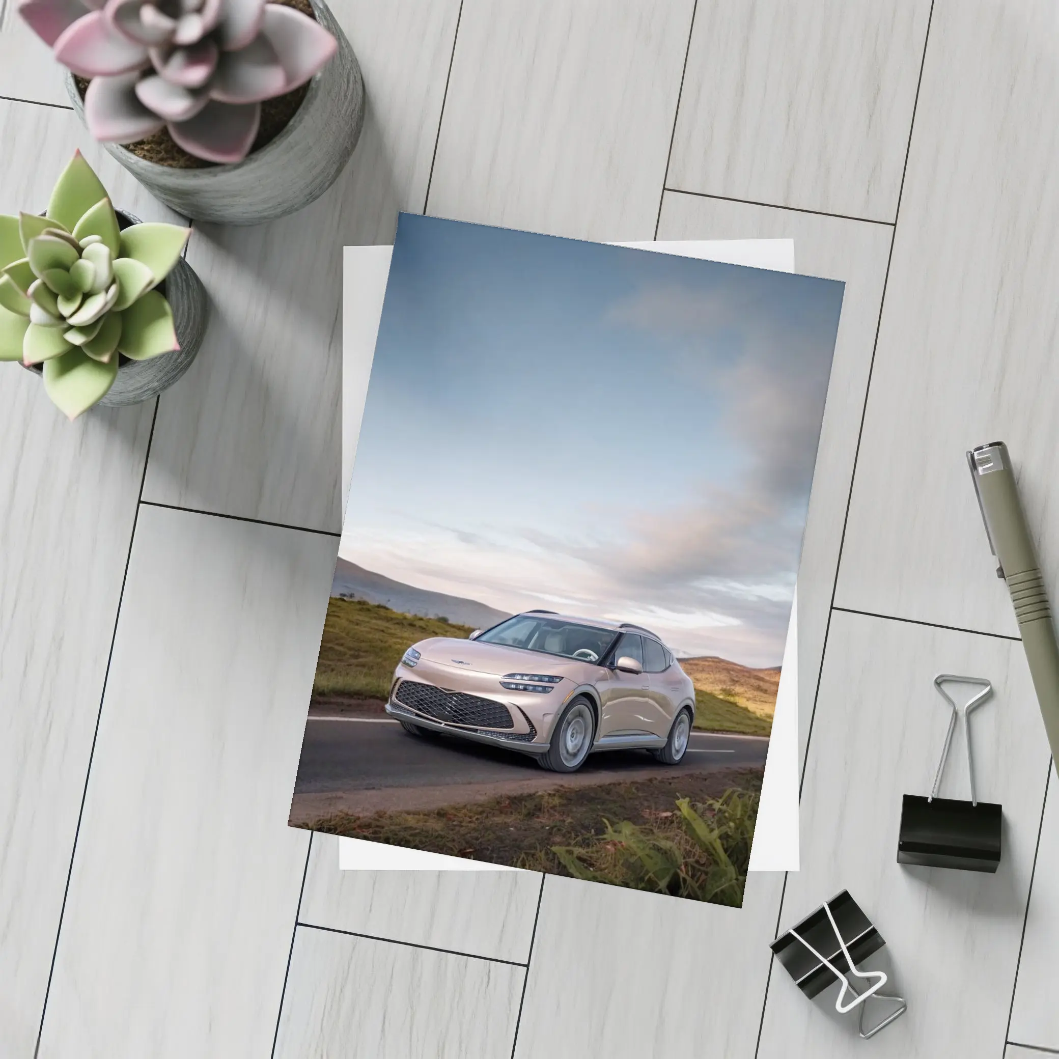 Genesis GV60 SUV on Scenic Highland Road – Postcards