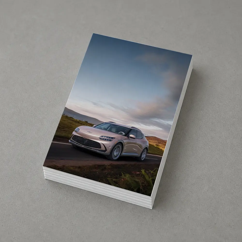Genesis GV60 SUV on Scenic Highland Road – Postcards