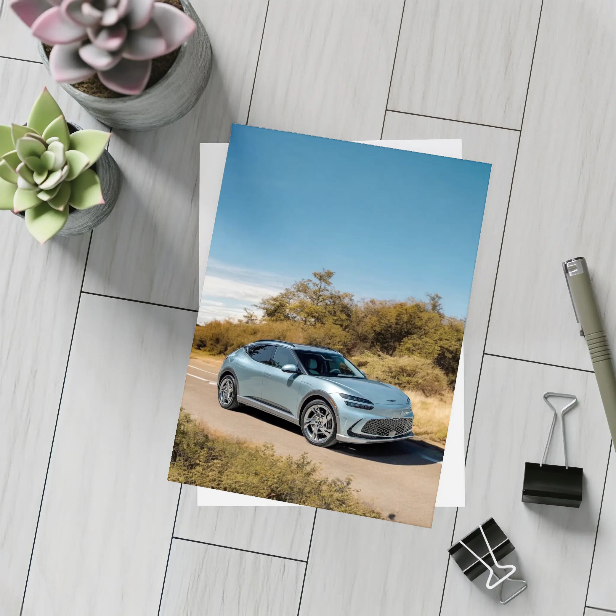 Genesis GV60 Silver SUV Desert Road – Postcards