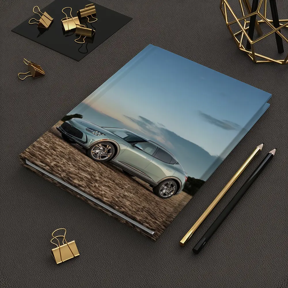 Genesis GV60 Parked on Sandy Beach – Notebooks