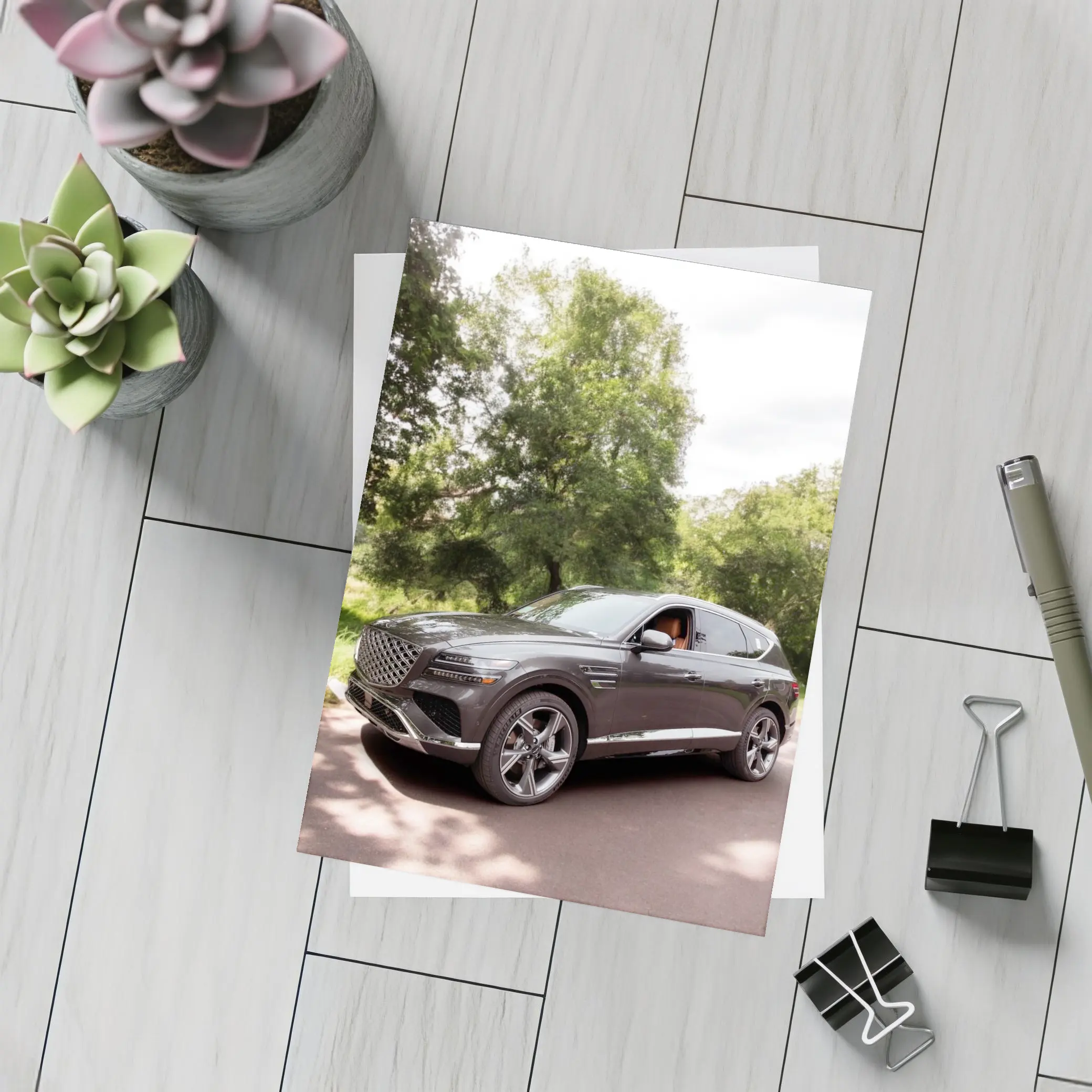 Genesis GV80 SUV Parked Among Green Trees – Postcards