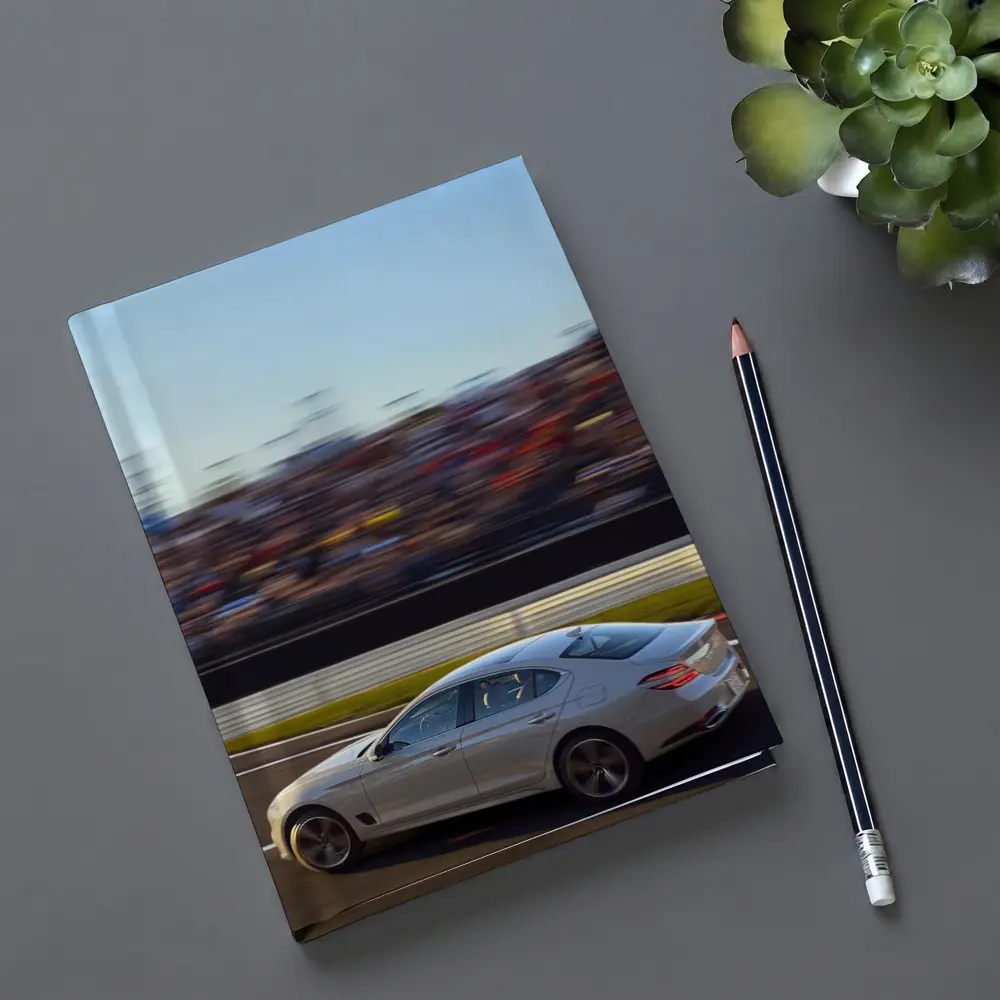 Genesis G70 Racing On Blurred Track – Notebooks