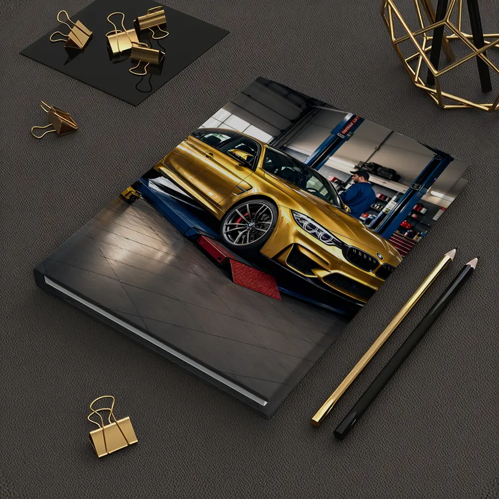 Gold BMW M3 Inside Auto Service Garage – Notebooks