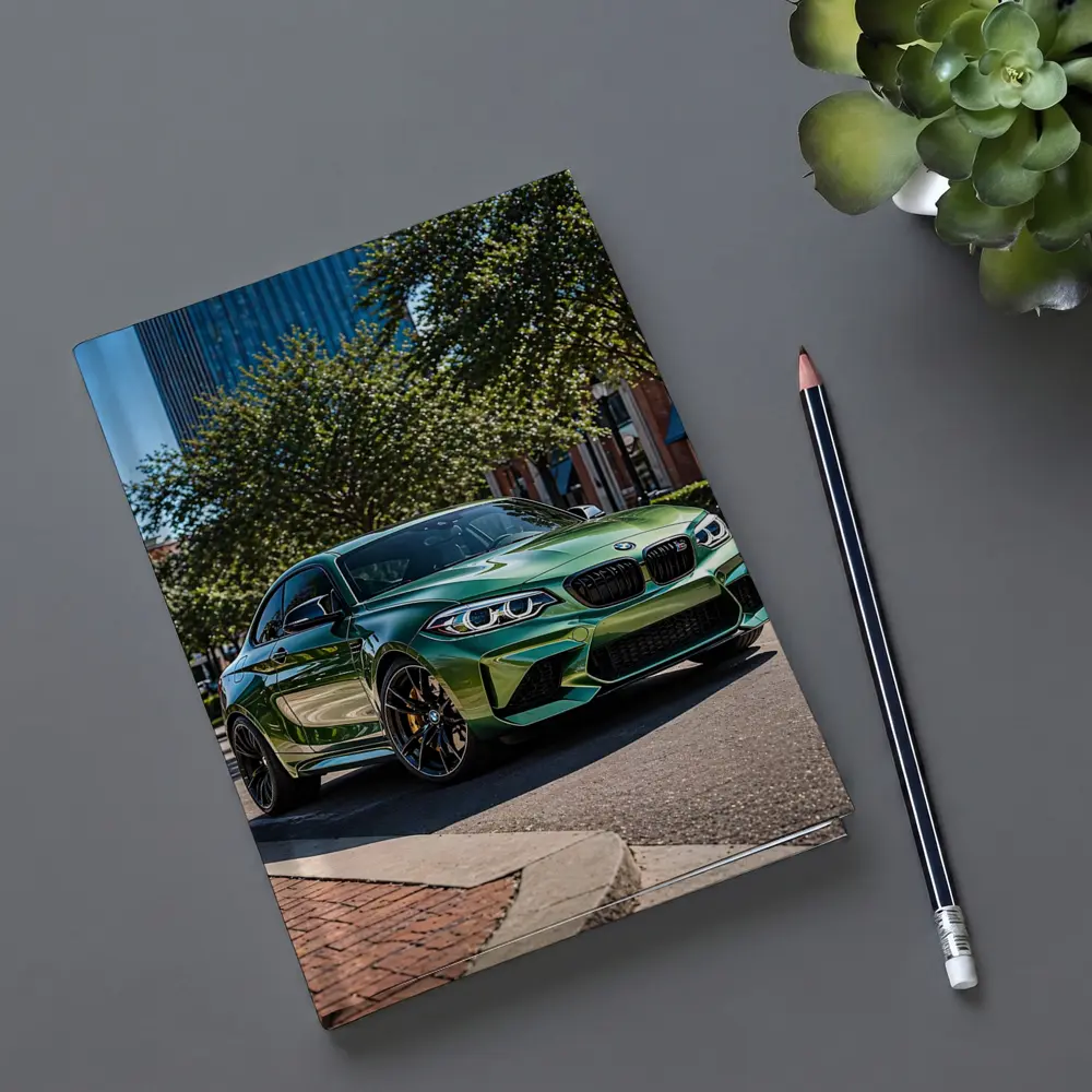 Green BMW M2 Parked Downtown City Street – Notebooks