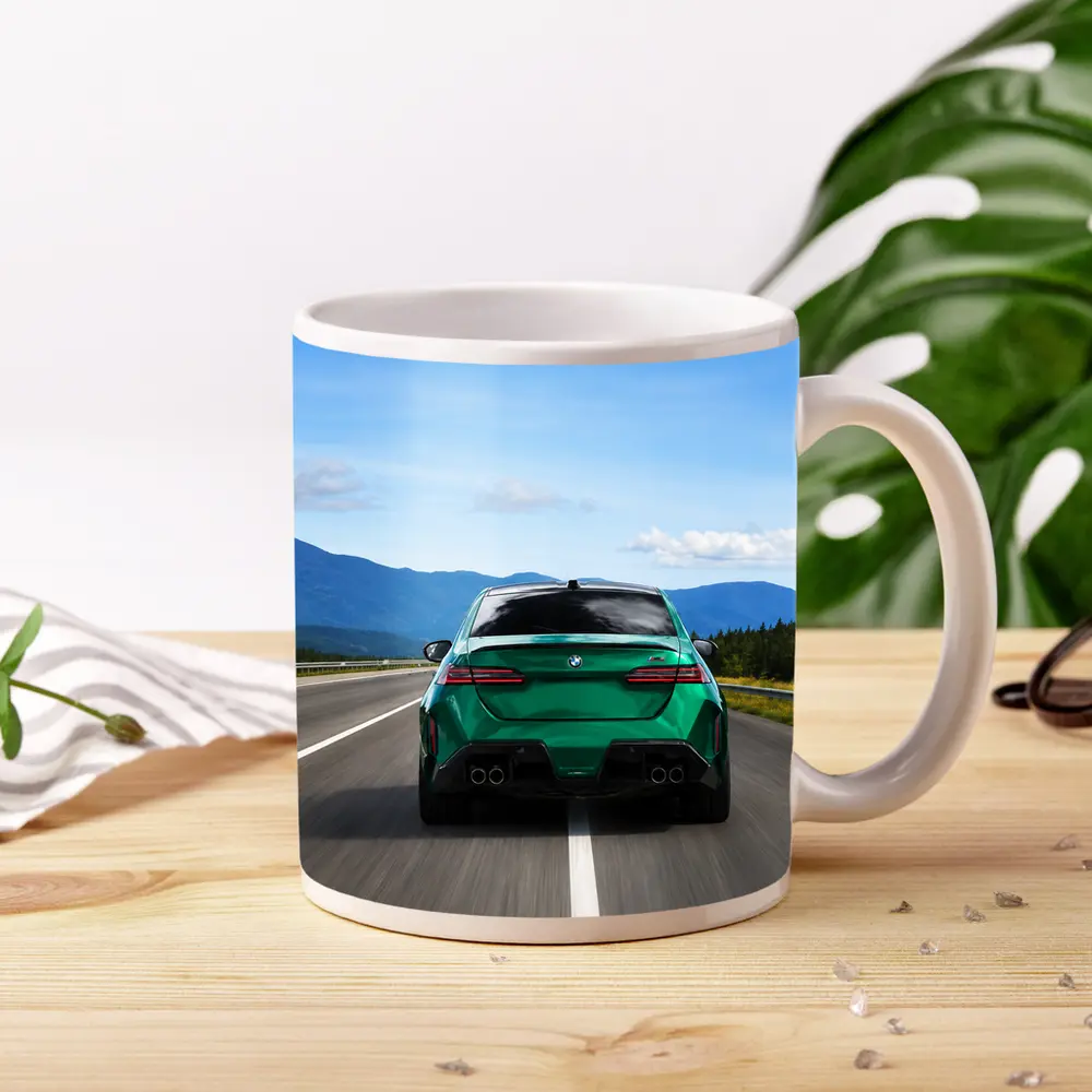 Green BMW M5 Sedan Speeding On Highway – Mugs
