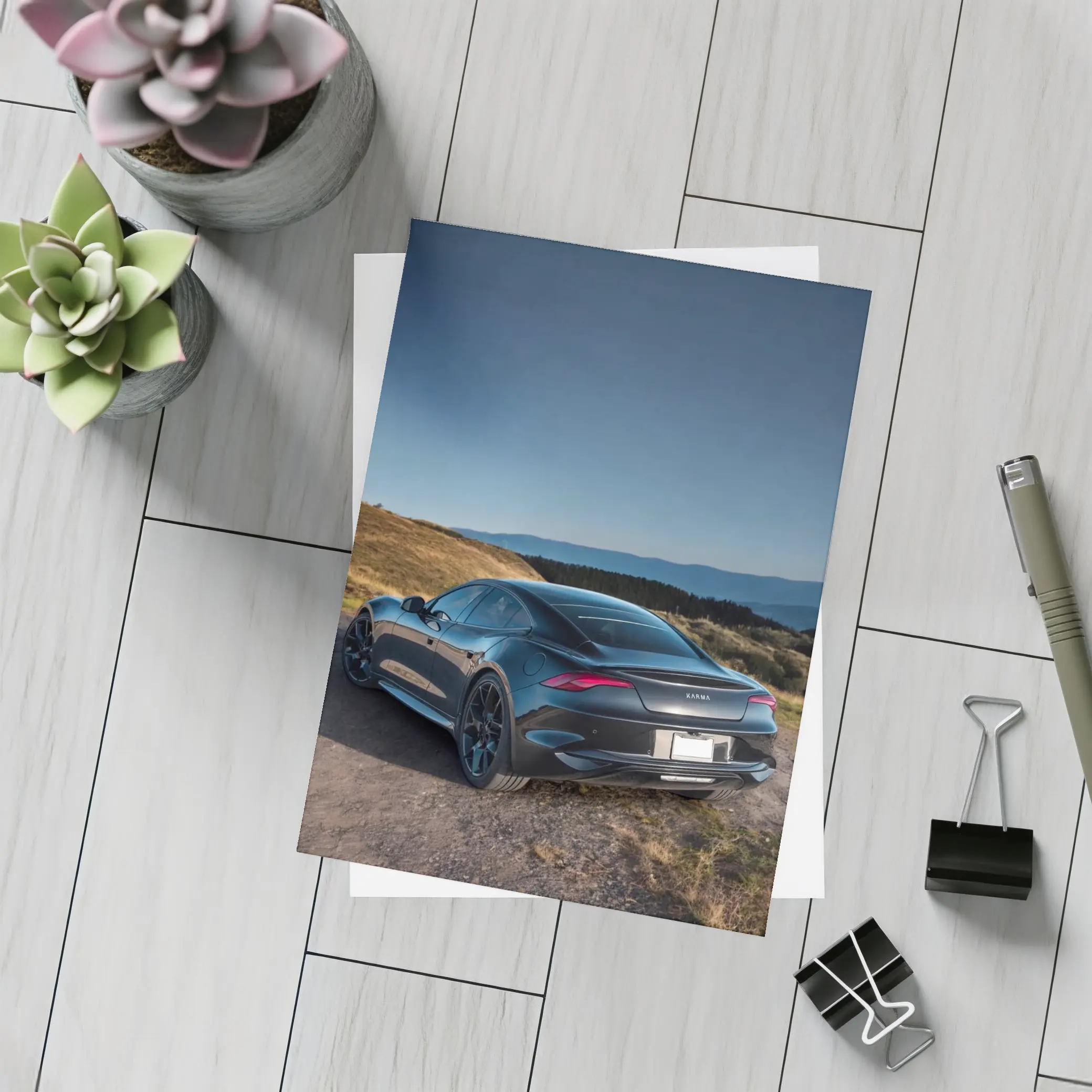 Karma Revero Dark Sedan Hillside Blue Sky – Postcards