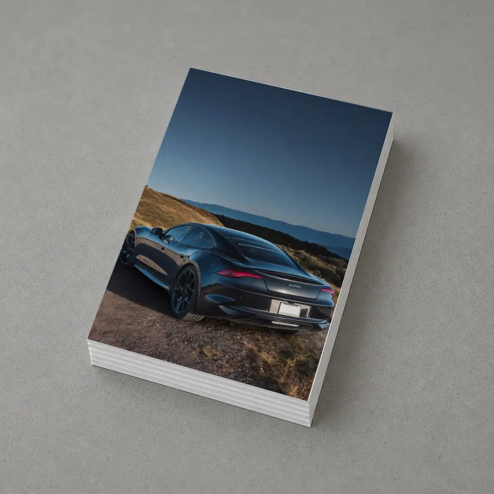 Karma Revero Dark Sedan Hillside Blue Sky – Postcards