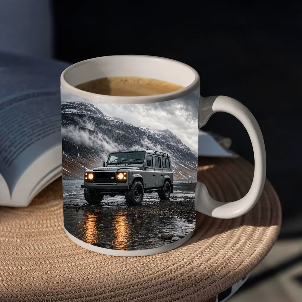 Land Rover Defender Parked On Rocky Shore – Mugs