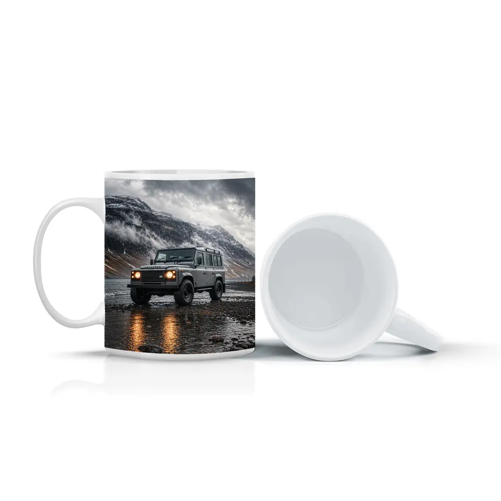 Land Rover Defender Parked On Rocky Shore – Mugs