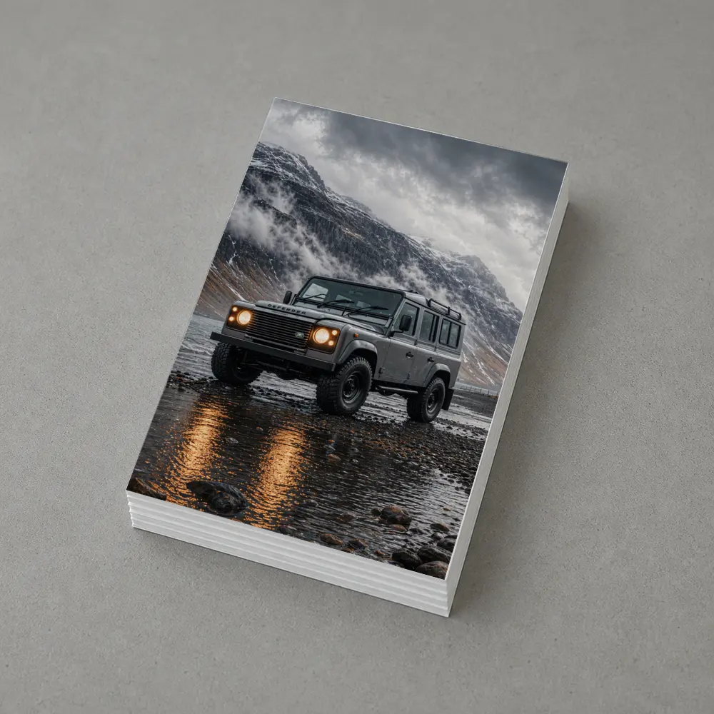 Land Rover Defender Parked On Rocky Shore – Postcards