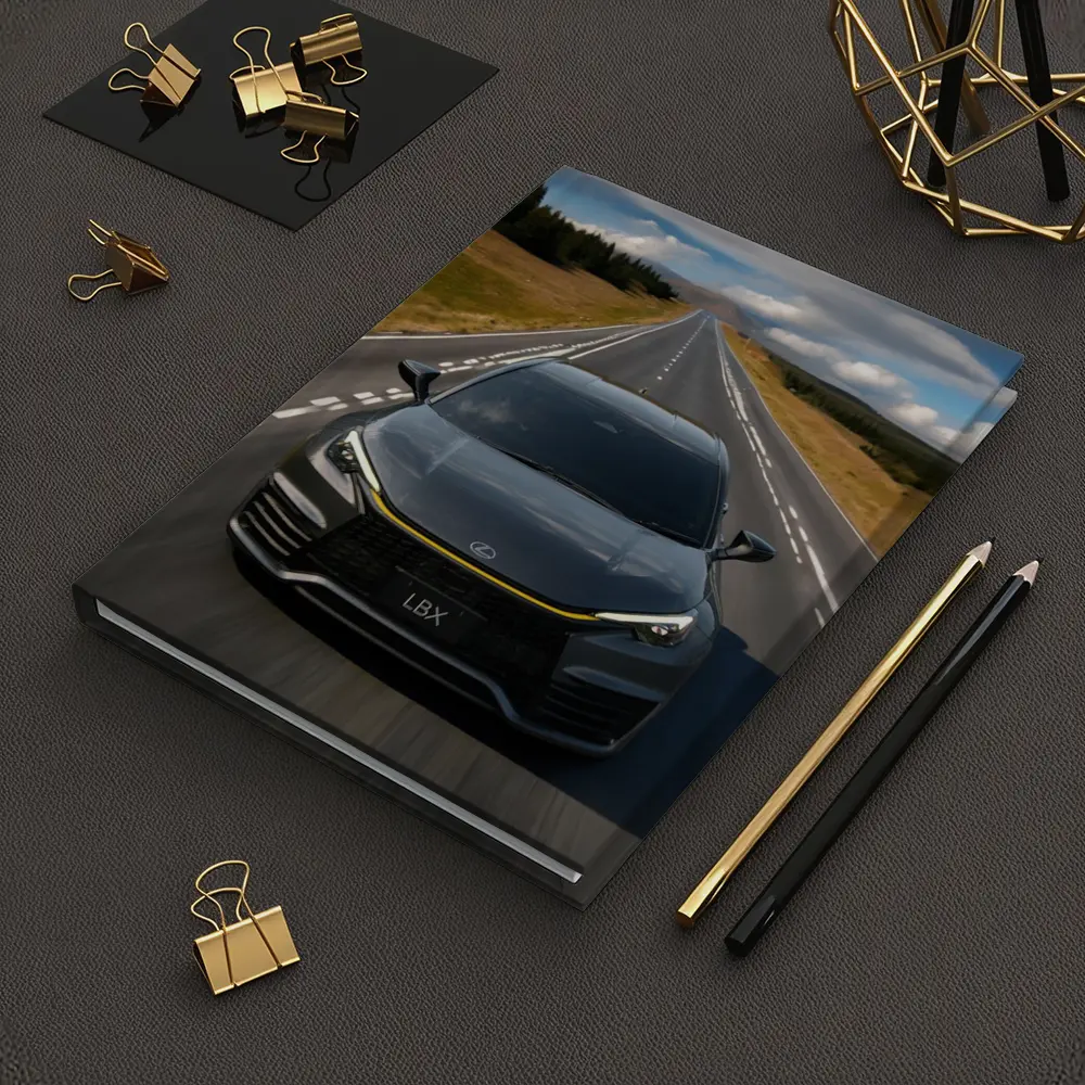 Lexus LBX Driving Open Road Dramatic Sky – Notebooks