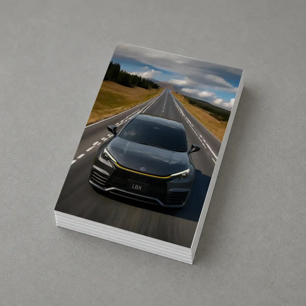 Lexus LBX Driving Open Road Dramatic Sky – Postcards