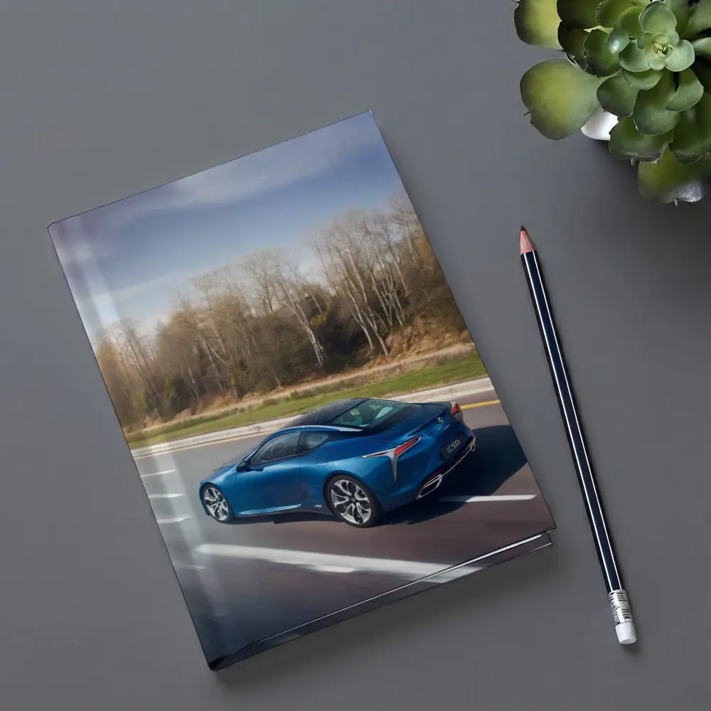 Lexus LC Blue Coupe On Open Highway – Notebooks