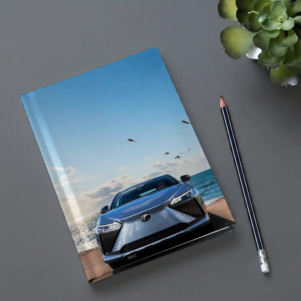 Lexus RZ Front View Ocean Background – Notebooks