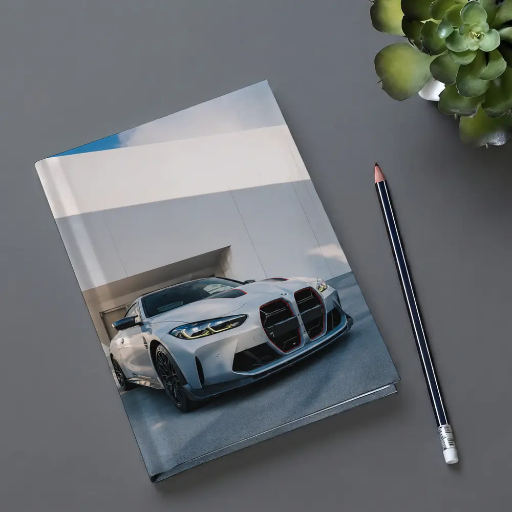 BMW M4 CSL Silver Against White Architecture – Notebooks