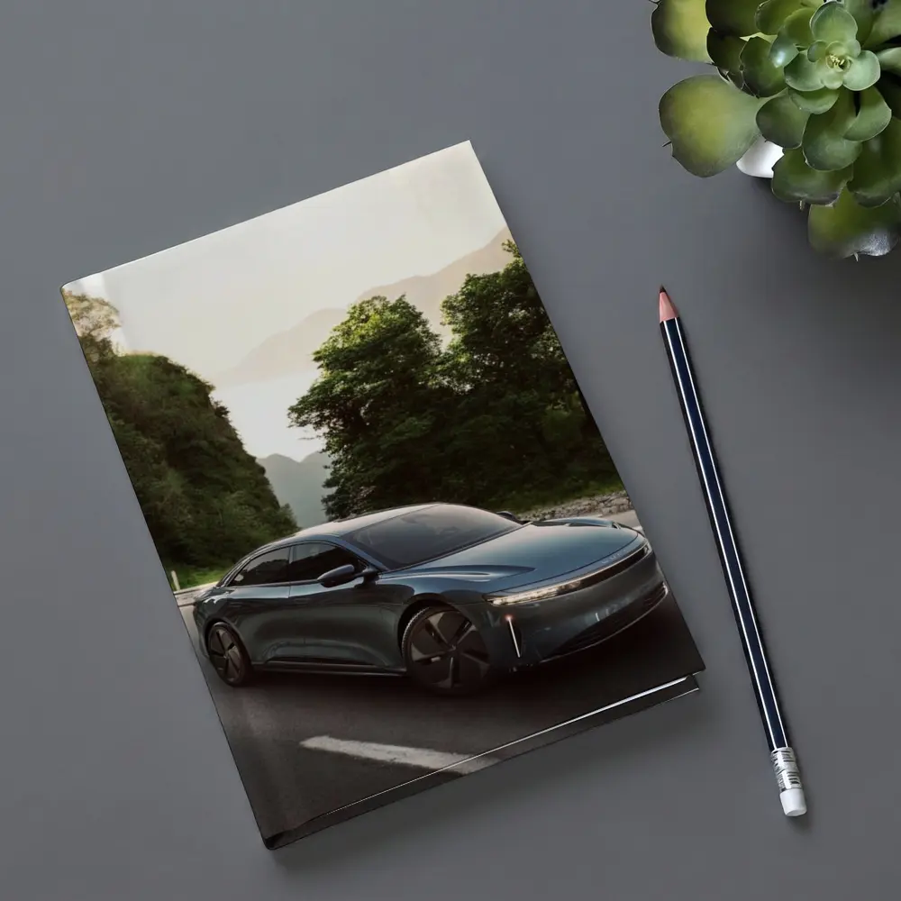 Lucid Air Sedan on Mountain Road Drive – Notebooks
