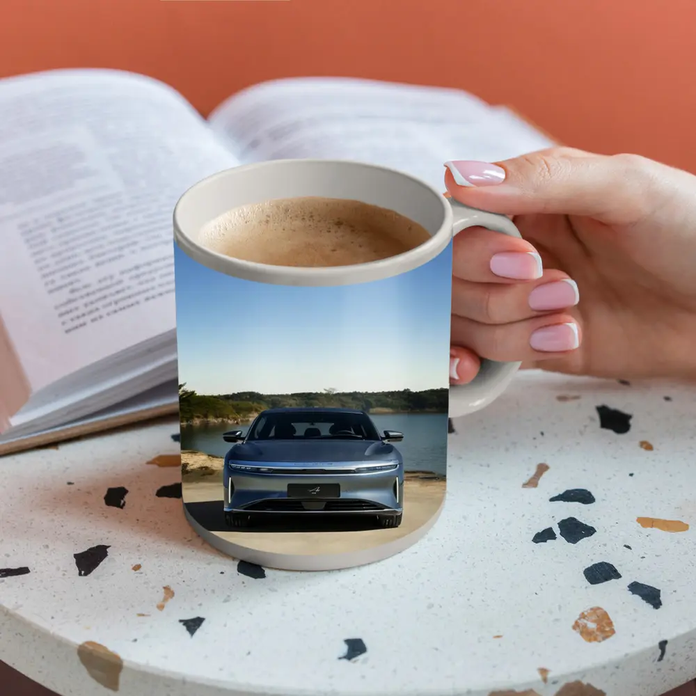 Lucid Air Pure Parked Near Calm Lake – Mugs