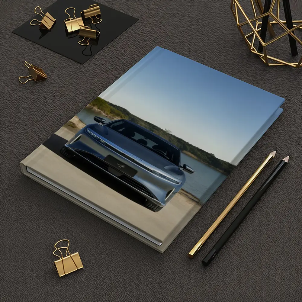 Lucid Air Pure Parked Near Calm Lake – Notebooks