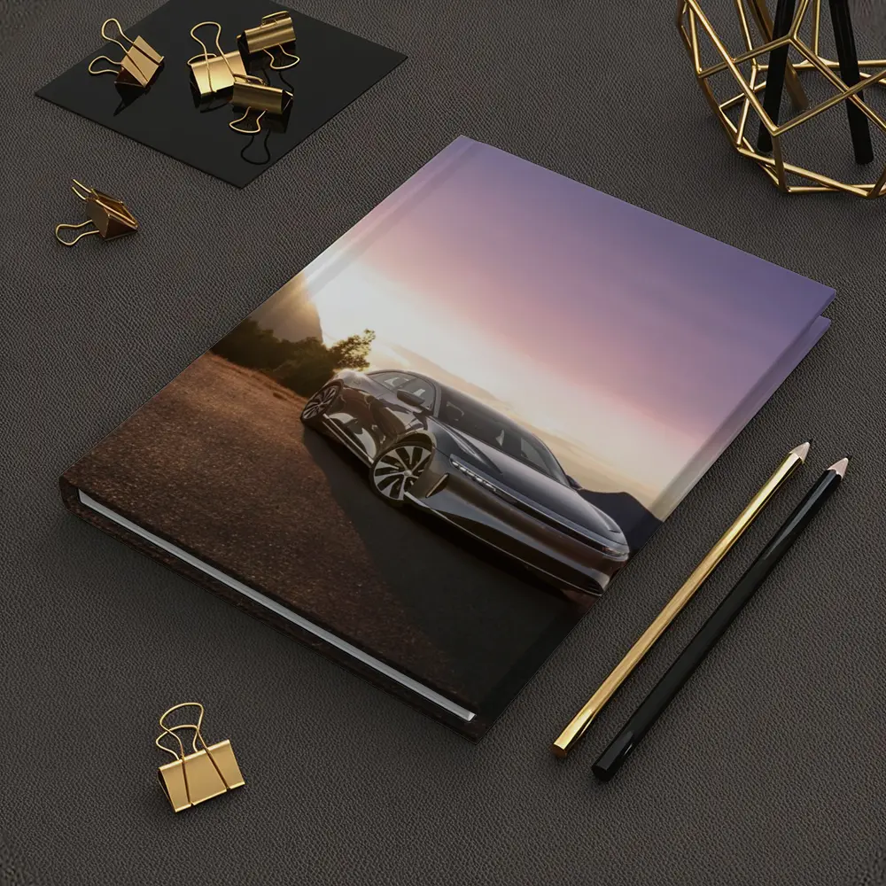 Lucid Air Parked Before Mountain Sunset – Notebooks