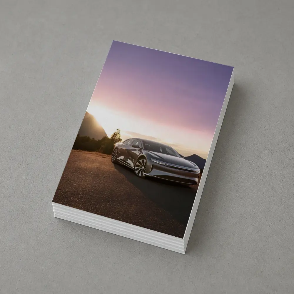 Lucid Air Parked Before Mountain Sunset – Postcards