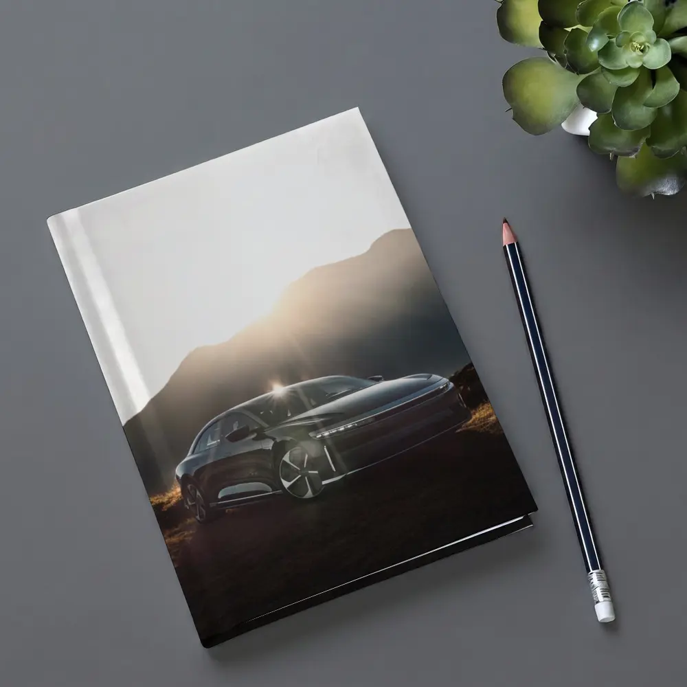 Lucid Air Sedan Sun Flare Mountain Backdrop – Notebooks