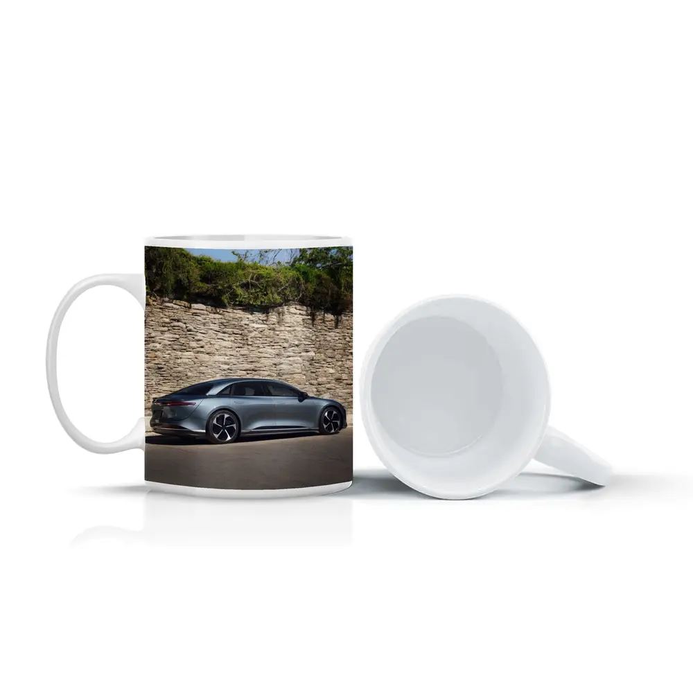 Lucid Air Sedan Parked By Stone Wall – Mugs