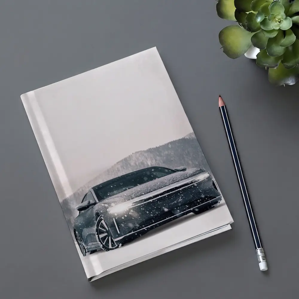 Lucid Air Electric Sedan In Snowy Landscape – Notebooks