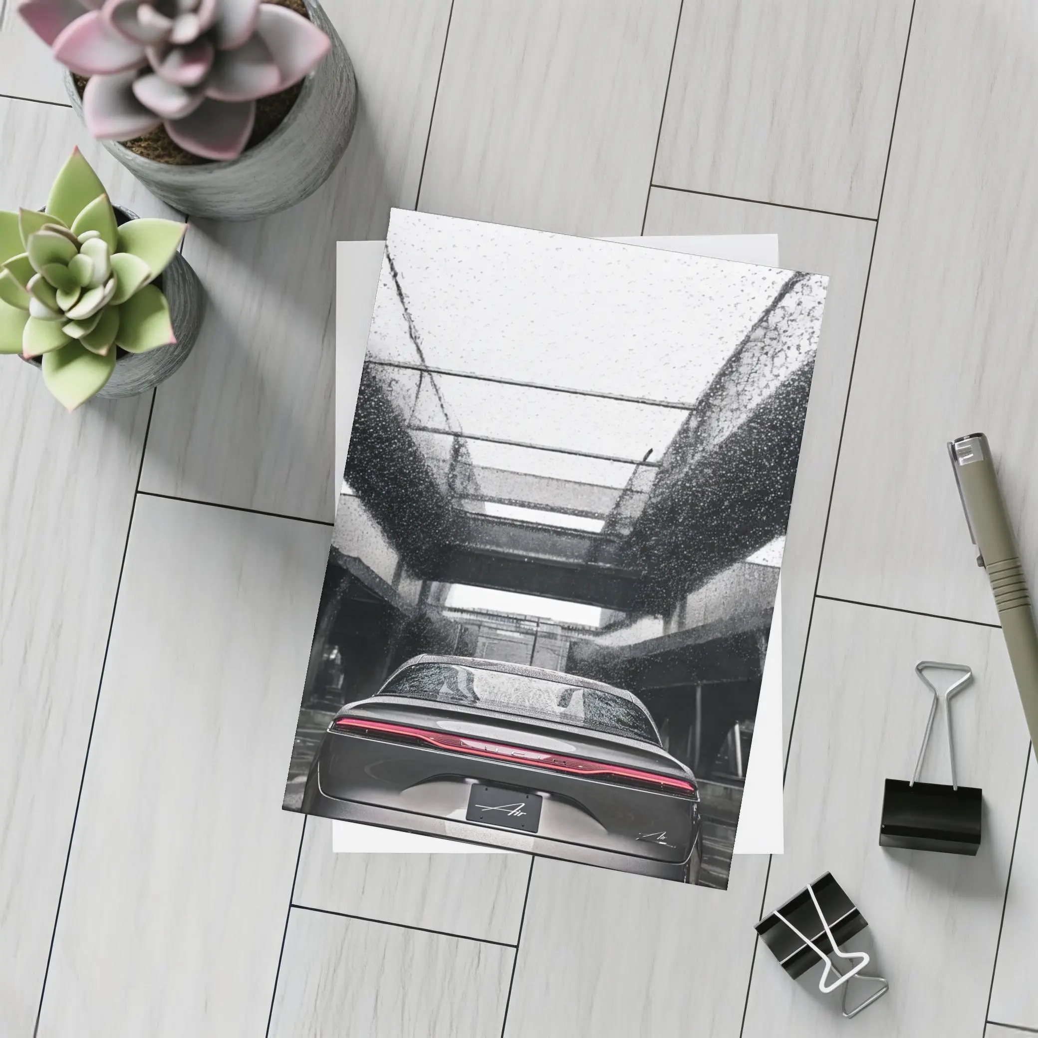 Lucid Air Sedan Rainy Urban Parking Structure – Postcards