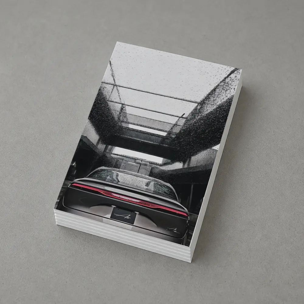 Lucid Air Sedan Rainy Urban Parking Structure – Postcards