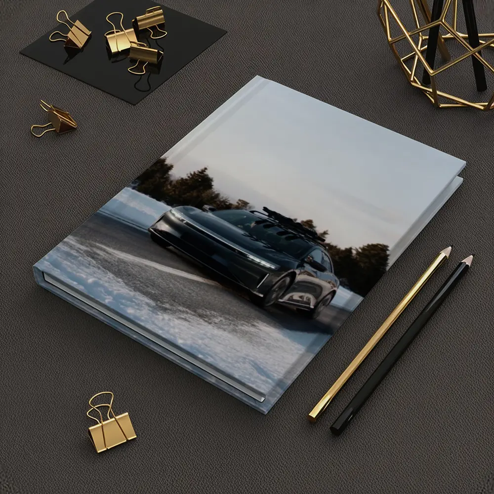 Lucid Air Driving Snowy Winter Road – Notebooks