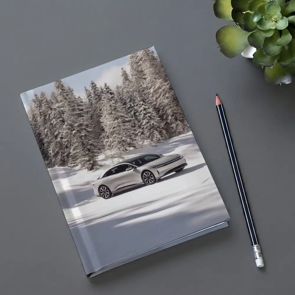 Lucid Air Sedan Snowy Winter Forest – Notebooks