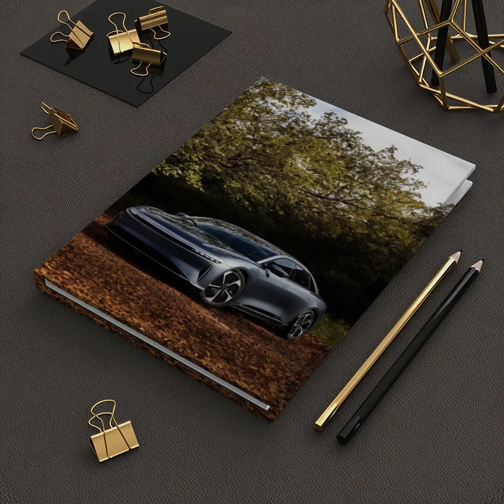 Lucid Air Electric Sedan Autumn Forest Setting – Notebooks