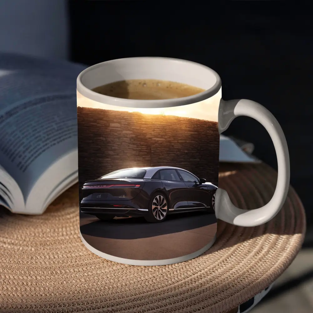 Lucid Air Sedan Parked Against Stone Wall – Mugs