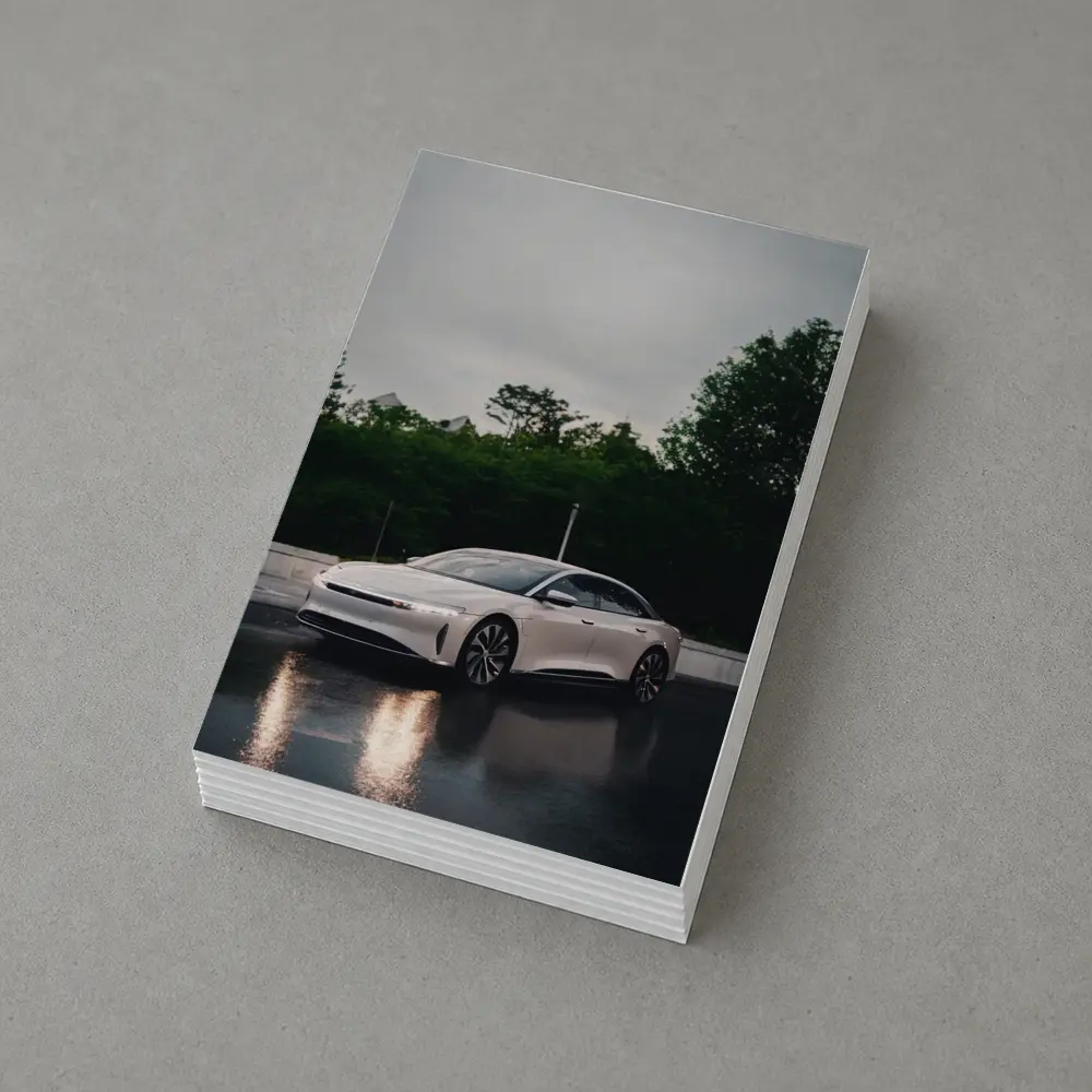 Lucid Air White Sedan Rainy City Street – Postcards