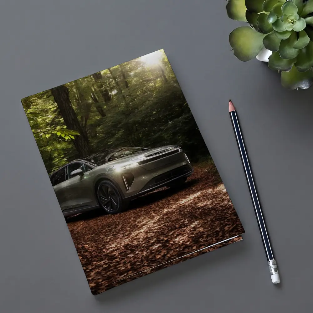 Lucid Gravity SUV Parked In Forest – Notebooks