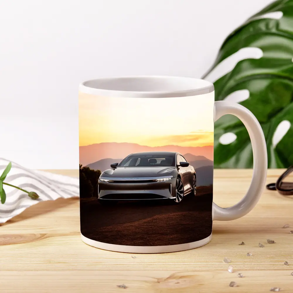 Lucid Air Sedan Mountain Sunset Background – Mugs
