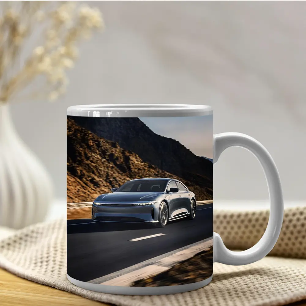 Lucid Air Speeding Through Rocky Mountain Road – Mugs