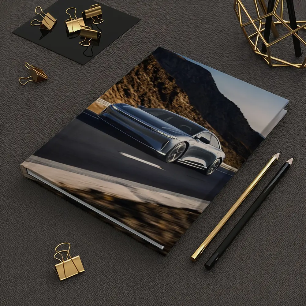 Lucid Air Speeding Through Rocky Mountain Road – Notebooks