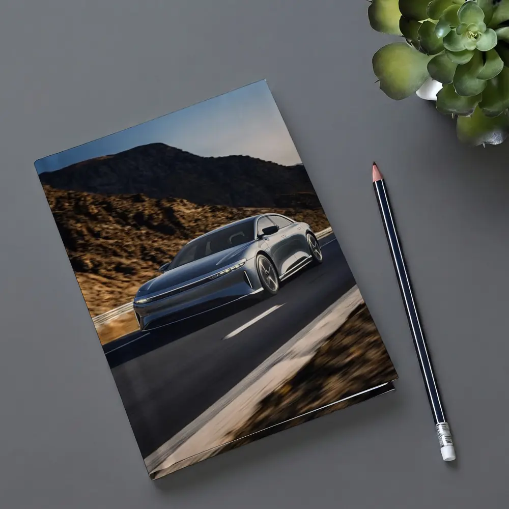 Lucid Air Speeding Through Rocky Mountain Road – Notebooks